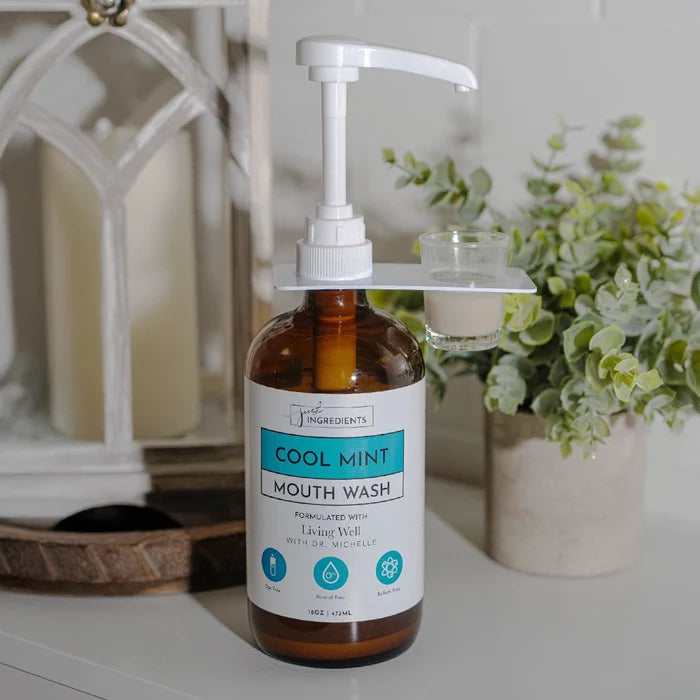 Easy-Dispense Mouthwash Pump and Cup in use