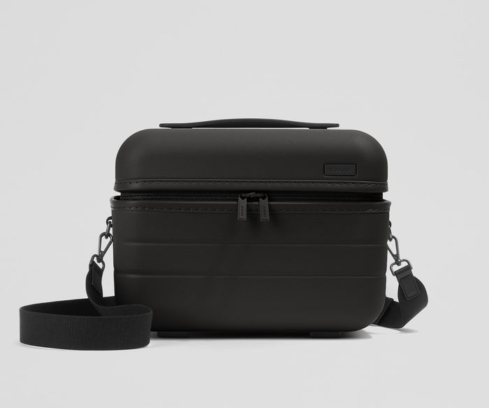 Front view of the Train Case with a detachable shoulder strap